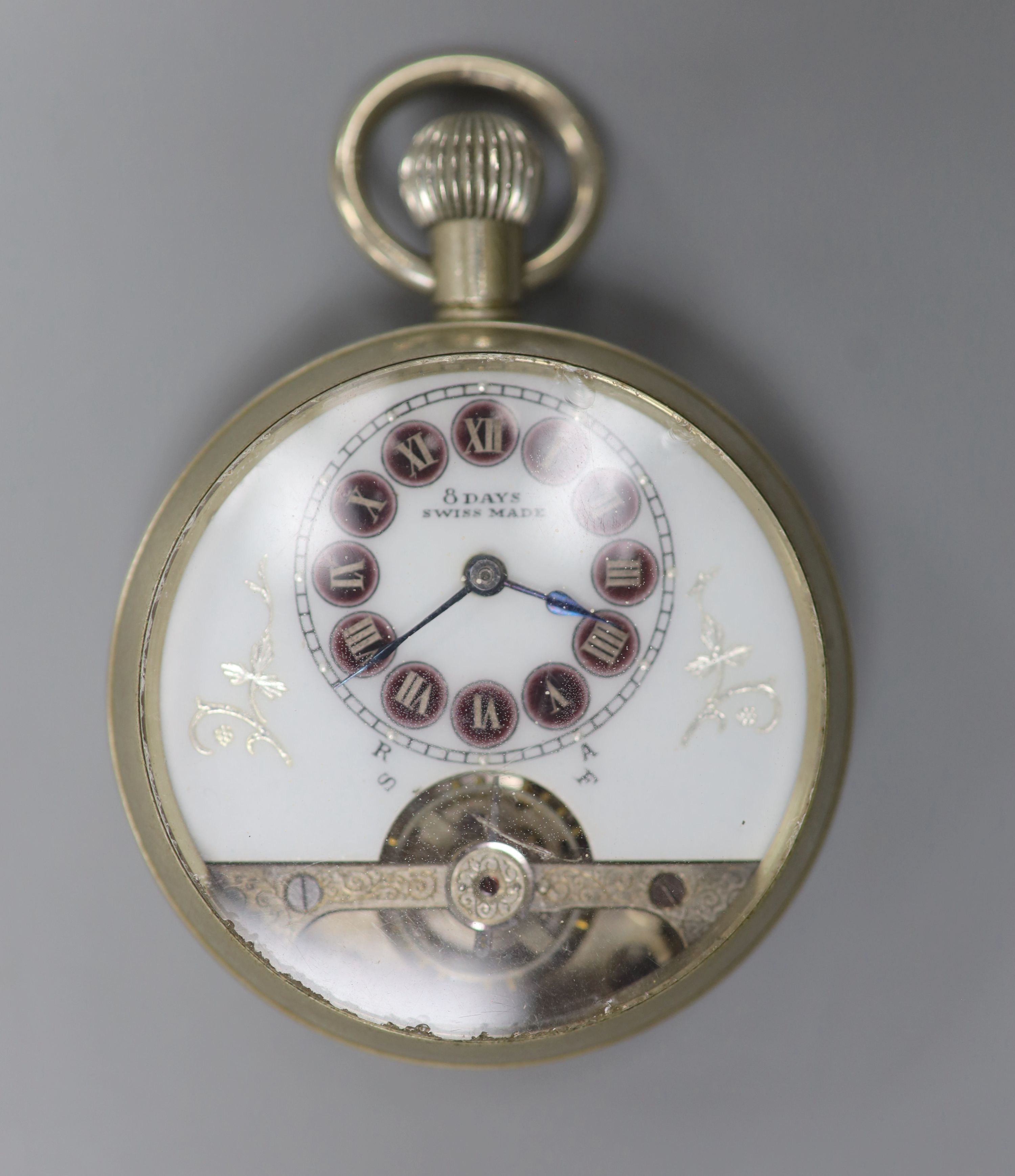 A Swiss white metal 8-day pocket watch with skeleton balance